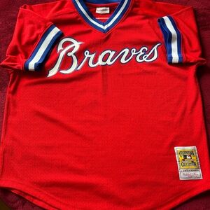 Authentic Mitchell & Ness Braves Jersey with Blue & White Trim.